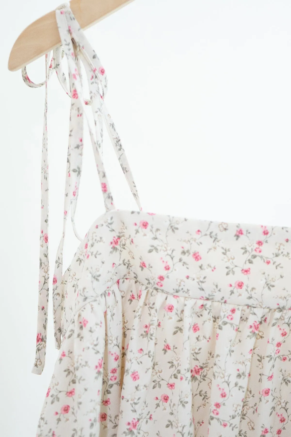 ODETTE FLORAL TRAPEZE ROMPER DRESS IN CREAM