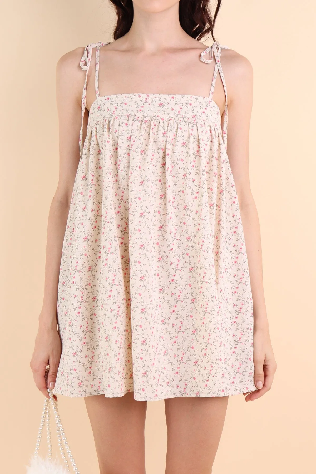 ODETTE FLORAL TRAPEZE ROMPER DRESS IN CREAM