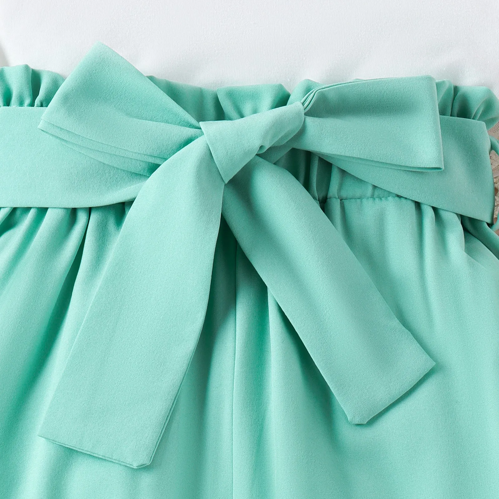 Spring and summer multi-color oblique shoulder straps single-side lace tops solid color belt trousers trendy suits FD